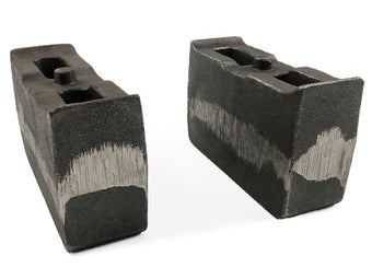 compare product Tuff Country 01-10 Chevy Silverado 2500HD/3500 4wd 4in Cast Iron Lift Blocks Pair