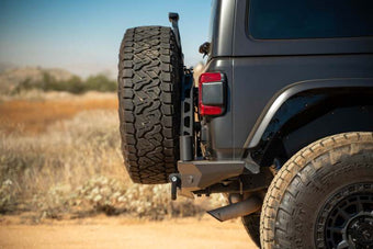 compare product DV8 Offroad 18-23 Jeep Wrangler JL MTO Series Bumper Spare Tire Swing Gate