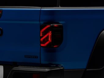 compare product Raxiom 20-23 Jeep Gladiator JT Axial Series LED Tail Lights- Black Housing (Smoked Lens)