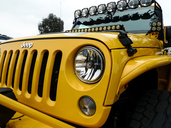 compare product KC HiLiTES 07-18 Jeep JK 7in. Gravity LED DOT Approved Replacement Headlight (Single)