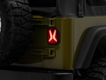 compare product Raxiom 76-06 Jeep CJ7 Wrangler YJ & TJ Gladiator LED Tail Lights- Black Housing (Smoked Lens)