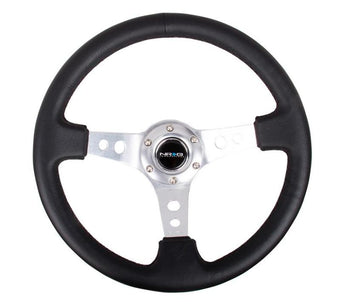 compare product NRG Reinforced Steering Wheel (350mm / 3in. Deep) Blk Leather w/Silver Spoke & Circle Cutouts
