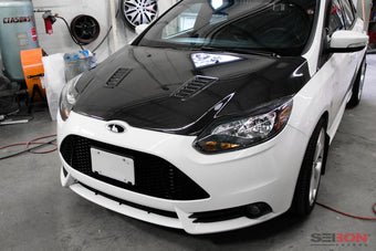 compare product Seibon 12-13 Ford Focus RS-Style Carbon Fiber Hood