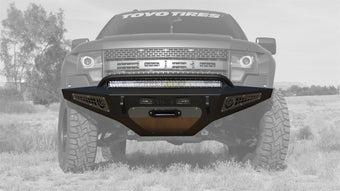 compare product Addictive Desert Designs 10-14 Ford F-150 Raptor HoneyBadger Front Bumper w/ Winch Mount