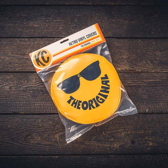 compare product KC HiLiTES Retro 8in Round Yellow Vinyl Light Cover w/ Black KC The Original Logo (Pair)