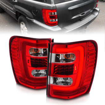 compare product ANZO 1999-2004 Jeep Grand Cherokee LED Tail Lights w/ Light Bar Chrome Housing Red/Clear Lens