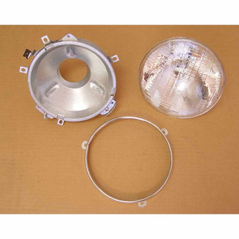 compare product Omix Headlight Assembly With Bulb 72-86 Jeep CJ Models