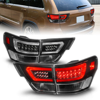compare product ANZO 11-13 Jeep Grand Cherokee LED Taillights w/ Lightbar Black Housing/Clear Lens 4pcs