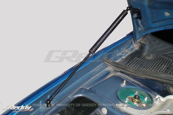 compare product GReddy 05-07 Subaru WRX/STi  Engine Hood Lifter Kit (Designed for OEM weight hoods.)