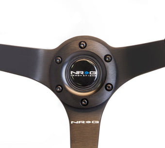 compare product NRG Reinforced Steering Wheel (350mm / 3in. Deep) Blk Suede w/Blk BBall Stitch (Odi Bakchis Edition)