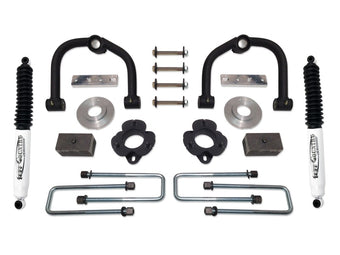compare product Tuff Country 04-15 Nissan Titan 4wd 4in Lift Kit (SX6000 Shocks)