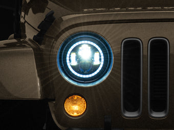compare product Raxiom 97-18 Jeep Wrangler TJ/JK Axial 7-Inch LED Headlights w/RGB Halo- Black Housing (Clear Lens)