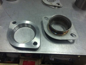 compare product Invidia Subaru Stock Downpipe to 3in Catback Adapter
