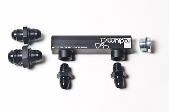 compare product Radium Engineering Universal 4-Port Manifold - Black W/ Logo