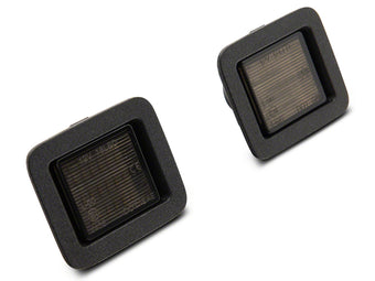 compare product Raxiom 07-14 Ford F-150 Axial Series LED License Plate Lamps- Smoked