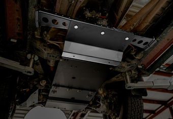 compare product Cali Raised 16-23 Toyota Tacoma Transfer Case Skid Plate /Yes Manual Transmission/Steel/PwdrCoated