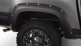 compare product Bushwacker 15-18 GMC Canyon (Excl. ZR2) Fleetside Pocket Style Flares 2pc 74.0in Bed - Black