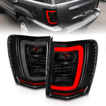 compare product ANZO 1999-2004 Jeep Grand Cherokee LED Tail Lights w/ Light Bar Black Housing Smoke Lens