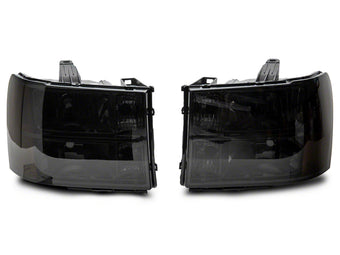 compare product Raxiom 07-14 GMC Sierra 1500/2500 HD/3500 HD Axial OEM Rep Headlights- Chrome Housing- Smoked Lens