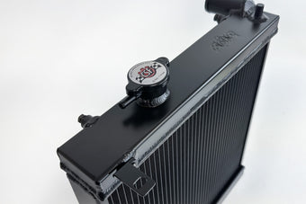 compare product CSF 03-07 Mitsubishi Lancer EVO 7/8/9 1/2 Size Radiator - Black