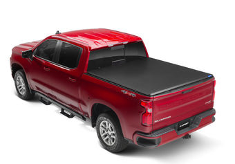 compare product Lund 88-99 Chevy C1500 Fleetside (8ft. Bed) Hard Fold Tonneau Cover - Black
