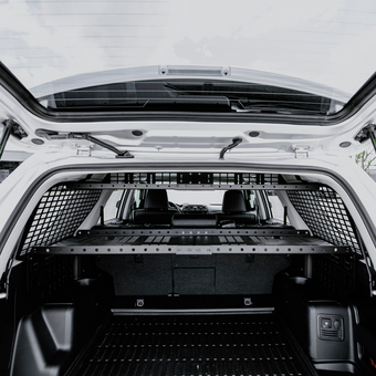 compare product Cali Raised 10-24 Toyota 4Runner Interior Rear Molle Panel - 2 Row Seating/Both Sides & Middle Tray