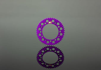 compare product Renthal 94+ Kawasaki KX 125-450 Rear Grooved Sprocket - Purple 520-49 Teeth