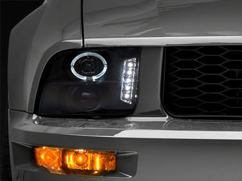compare product Raxiom 05-09 Ford Mustang Excluding GT500 LED Halo Projector Headlights- Black Housing (Clear Lens)