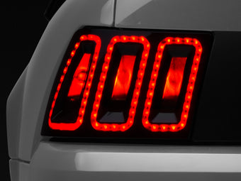 compare product Raxiom 99-04 Ford Mustang Excluding 99-01 Cobra Icon LED Tail Lights- Black Housing (Smoked Lens)