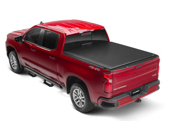 compare product Lund 15-17 Chevy Colorado (6ft. Bed) Genesis Roll Up Tonneau Cover - Black