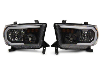 compare product Raxiom 07-13 Toyota Tundra Axial Series Headlights w/ LED Bar- Black Housing (Clear Lens)