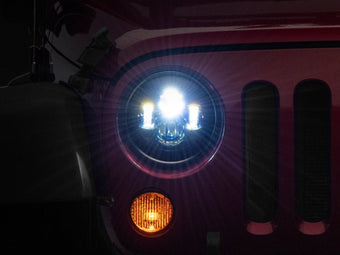 compare product Raxiom 97-18 Jeep Wrangler TJ/JK Axial Series LED Daymaker Headlights- Black Housing (Clear Lens)