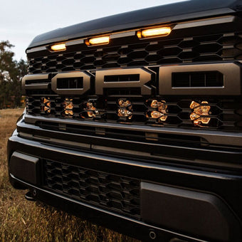 compare product Baja Designs 2021+ Ford Raptor (Incl. 2024 R/37) Squadron Pro 2.0 Behind Grille Kit (MP) - Clear