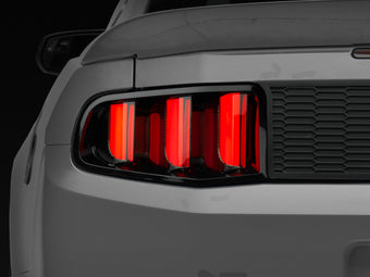 compare product Raxiom 10-12 Ford Mustang Vector V2 LED Tail Lights - Gloss Black Housing (Clear Lens)