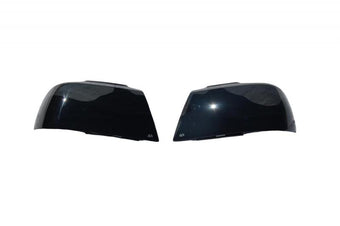 compare product AVS 07-13 GMC Sierra 1500 Headlight Covers - Smoke