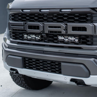 compare product Baja Designs 2021+ Ford Raptor OnX6 Behind Grill Kit -10in. Clear D/C