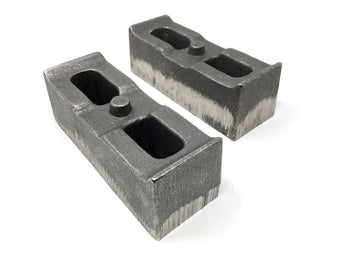 compare product Tuff Country 01-10 Chevy Silverado 2500HD/3500 4wd 2in Cast Iron Lift Blocks Pair