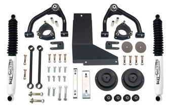 compare product Tuff Country 07-13 Chevy Suburban 1500 4x4 4in Uni-Ball Lift Kit (SX8000 Shocks)