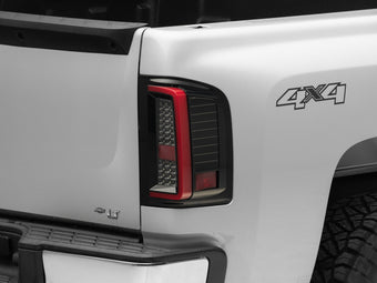 compare product Raxiom 07-13 Chevy Silverado 1500 G2 LED Tail Lights- Black Housing (Clear Lens)