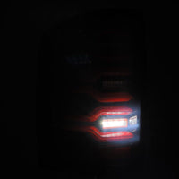 AlphaRex 14 - 18 GMC Sierra 1500/2500HD/3500HD LUXX - Series LED Tail Lights Blk/Red w/Actv Lgt Seq. Sig - My Store