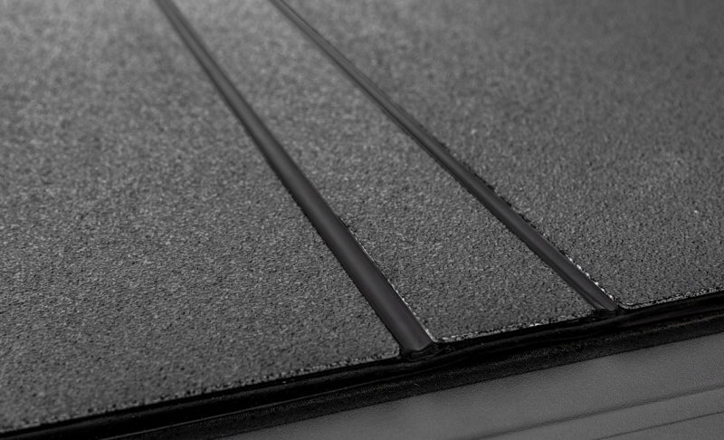 Access LOMAX Tri - Fold Cover Black Urethane Finish 04+ Ford F - 150 - 5ft 6in Bed - My Store