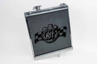 compare product CSF 03-07 Mitsubishi Lancer EVO 7/8/9 1/2 Size Radiator - Polished