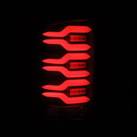 AlphaRex 14 - 18 GMC Sierra 1500/2500HD/3500HD LUXX - Series LED Tail Lights Blk w/Actv Light & Seq. Sig - My Store