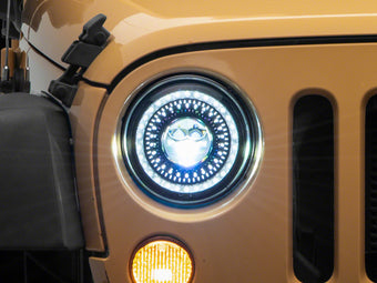 compare product Raxiom 07-18 Jeep Wrangler JK Axial Series 7-In Dragon Eye LED Headlights- Blk Housing (Clear Lens)