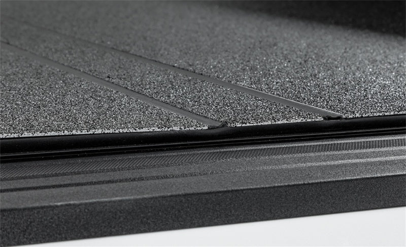 Access LOMAX Tri - Fold Cover Black Urethane Finish 04+ Ford F - 150 - 5ft 6in Bed - My Store