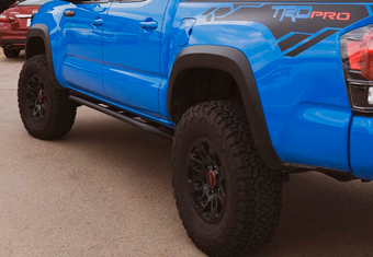 compare product Cali Raised 05-23 Toyota Tacoma Trail Ed Rock Sliders - Double Cab Short Bed/Kick Out/PwdrCoat
