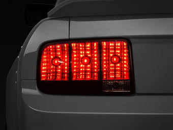 compare product Raxiom 05-09 Ford Mustang Tail Lights- Black Housing (Smoked Lens)